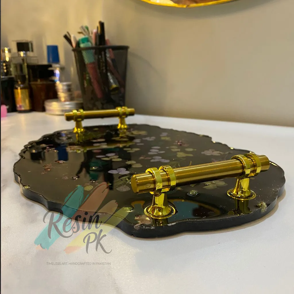 Black Botanical Resin Tray with real dried flowers and gold handles.